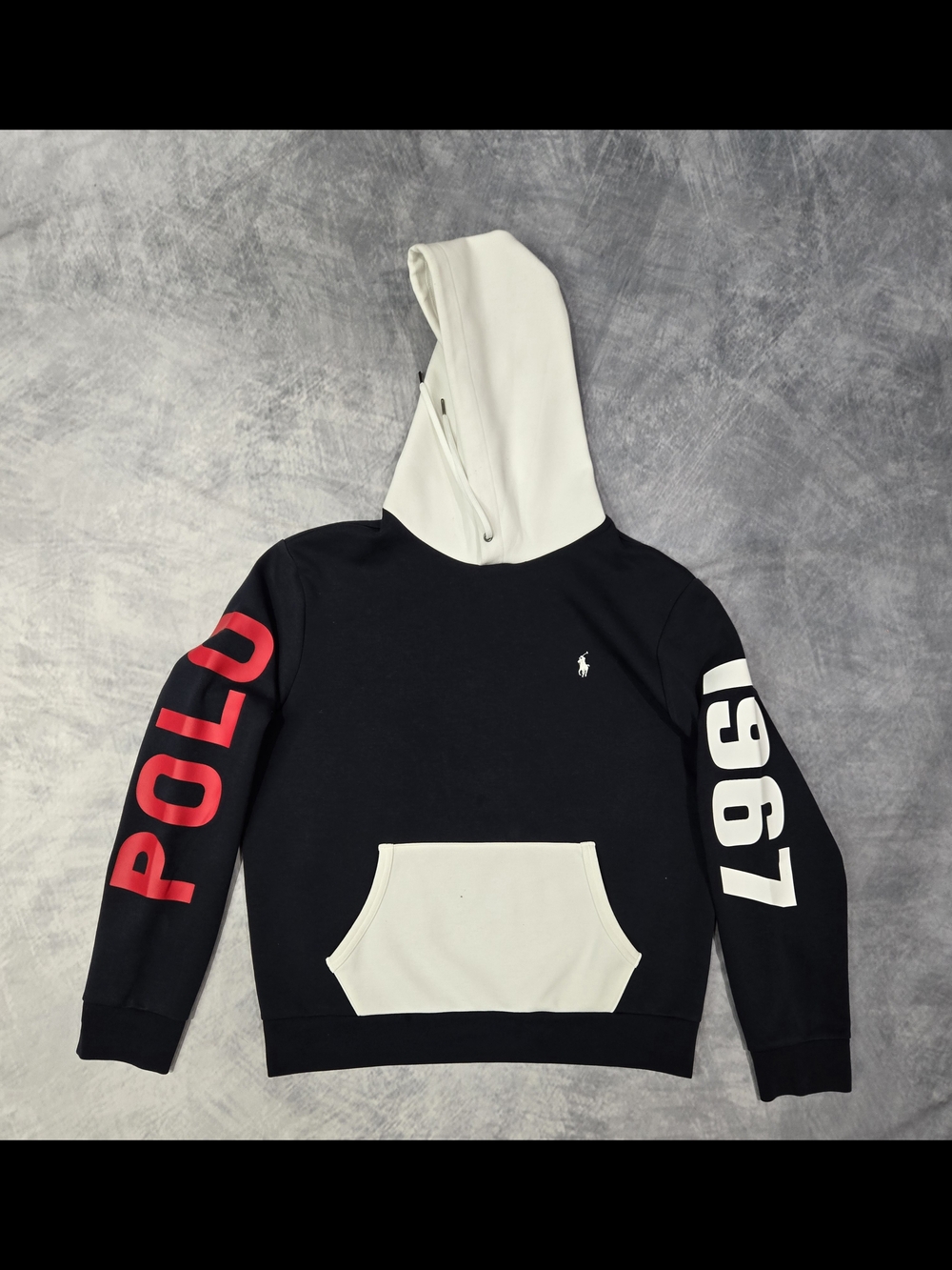 Polo Ralph Lauren 1967 color-blocked hoodie in navy and white with red logo deta